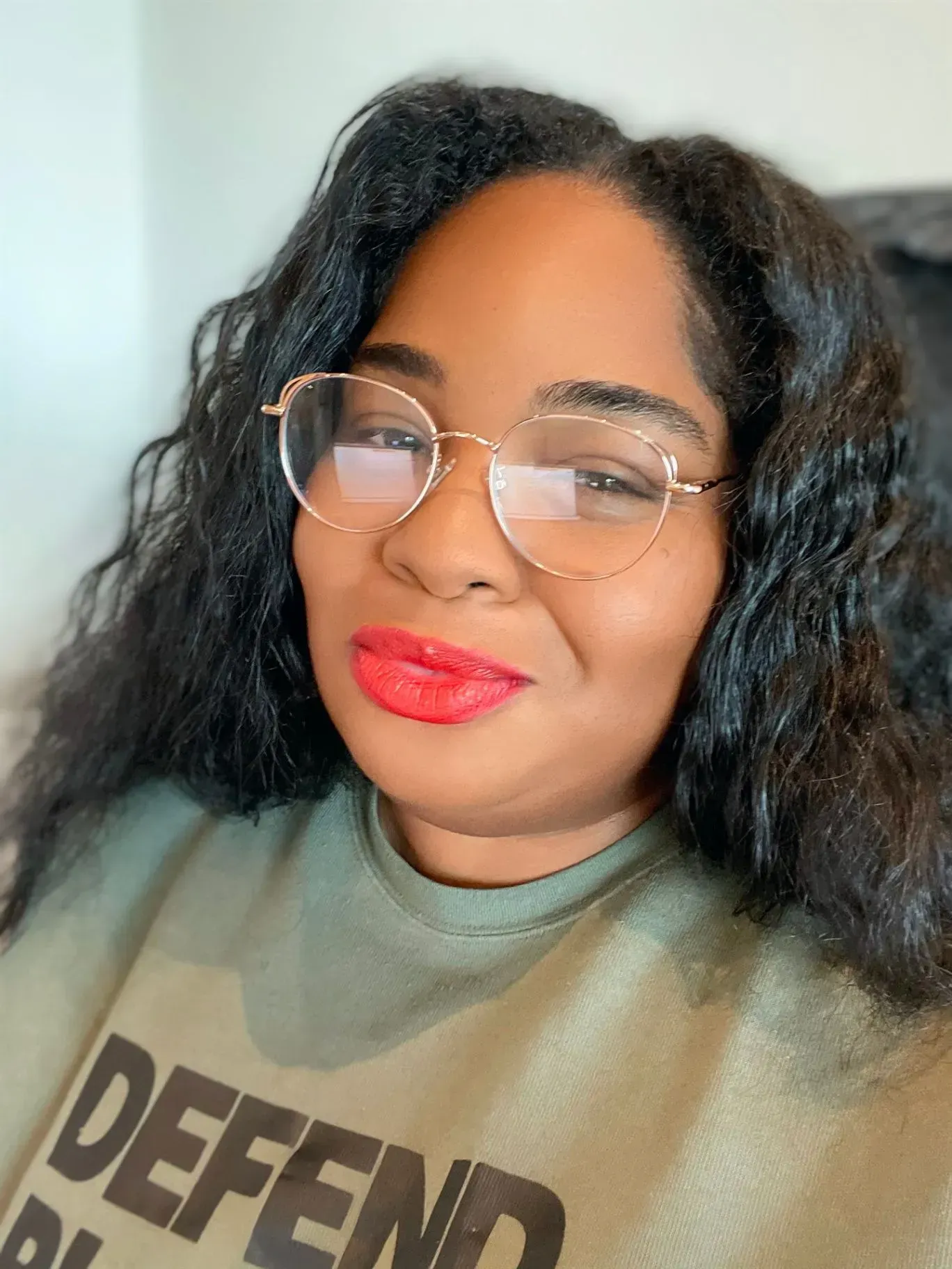 Amber Aziza wearing glasses