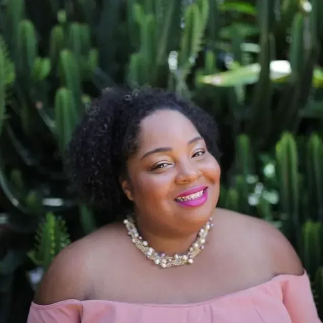 Amber Aziza in a pink portrait